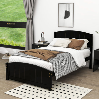 Lit plateforme simple en bois avec tête de lit