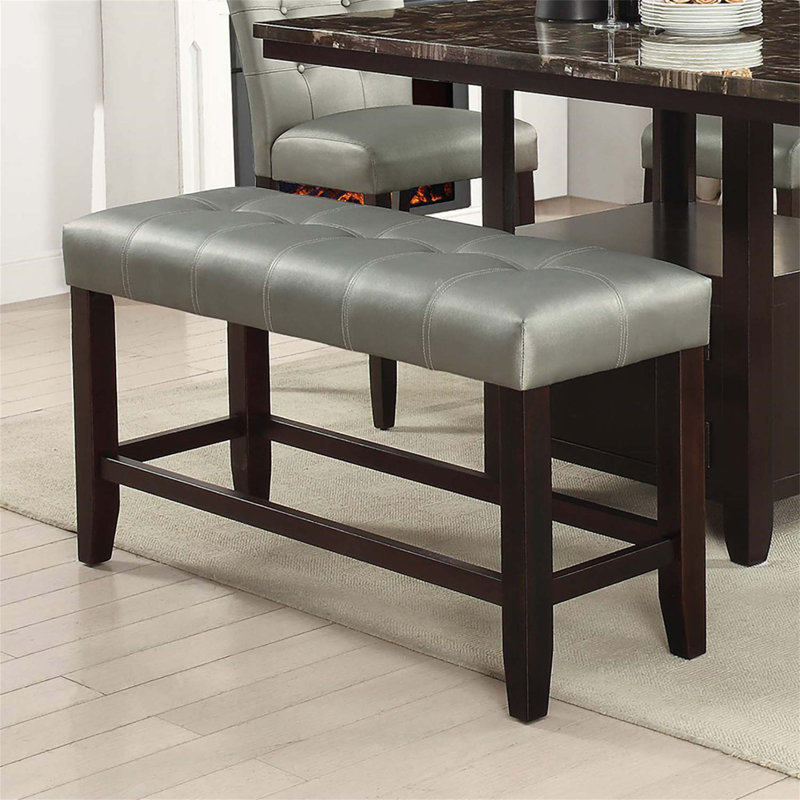 Banc à hauteur de comptoir avec coussin en similicuir, siège capitonné et base en bois pour une cuisine confortable