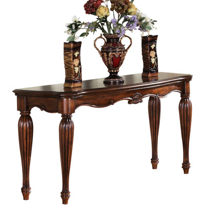 Table en placage de cerisier avec plateau rectangulaire et pieds sophistiqués de style traditionnel