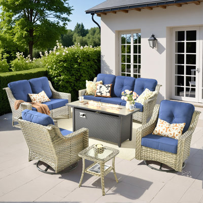 Demariea Outdoor Wicker 7 Person Seating Group With Cushions With Swivel Rocking Chairs And Fire Pit Table