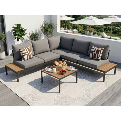 Ensemble de canapé de patio en rotin toutes saisons avec structure en aluminium, table basse en verre trempé, coussins à séchage rapide et tissu respirant résistant aux rayons UV pour une utilisation intérieure et extérieure.