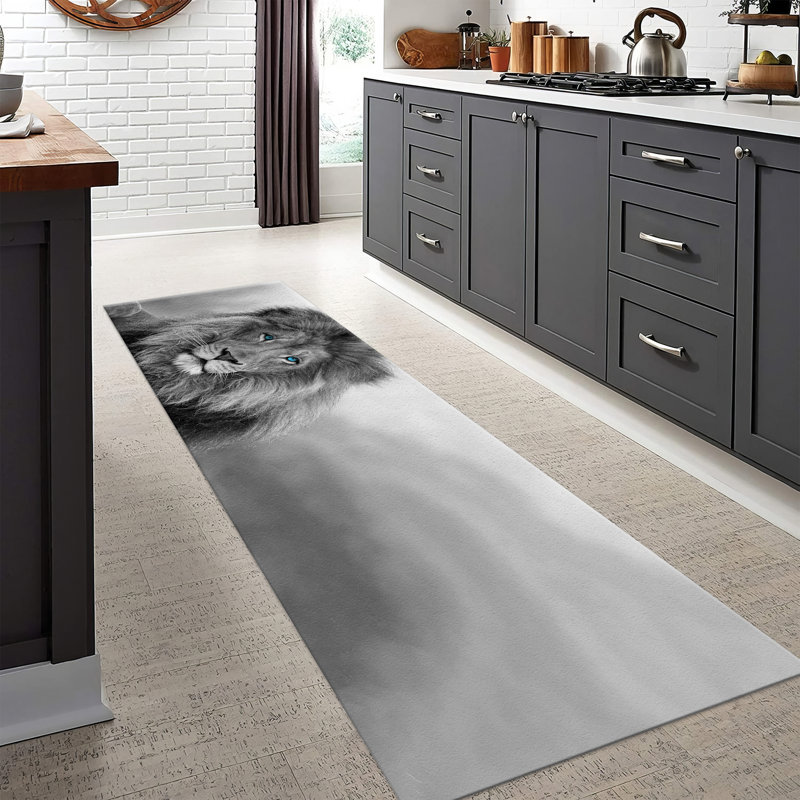 Ce tapis à motif géométrique non tissé à motif géométrique audacieux et coloré ajoute une touche de style à n'importe quelle pièce de votre maison ou de votre bureau
