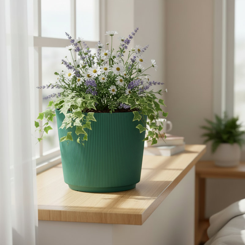 Pot à fleurs vert en résine recyclée