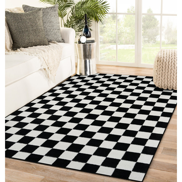 Tapis noir à motif géométrique Carpenter