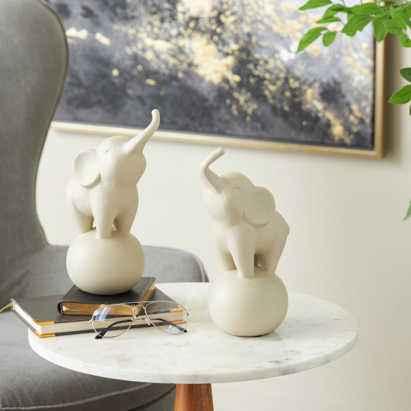 Cole And Grey Ceramic Trumpeting Elephant Decorative Sculpture With Round Base