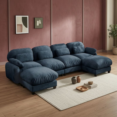 Canapé d'angle en U quatre places avec deux poufs