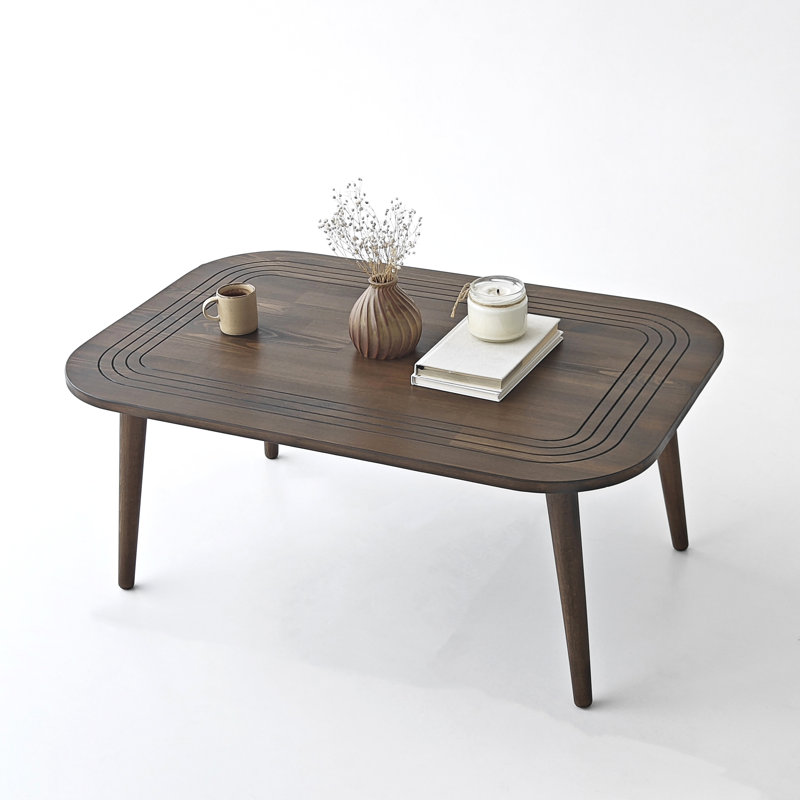 Table basse moderne en bois massif avec plateau rainuré Contour