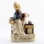 Drum and Dog Figurine