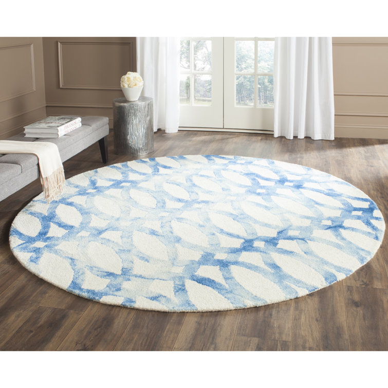 Amekia Hand Tufted Wool/Cotton Geometric Rug in Blue/Ivory