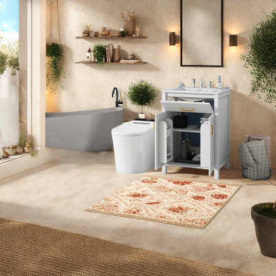 Meuble-lavabo peu encombrant avec lavabo en céramique, accents dorés modernes