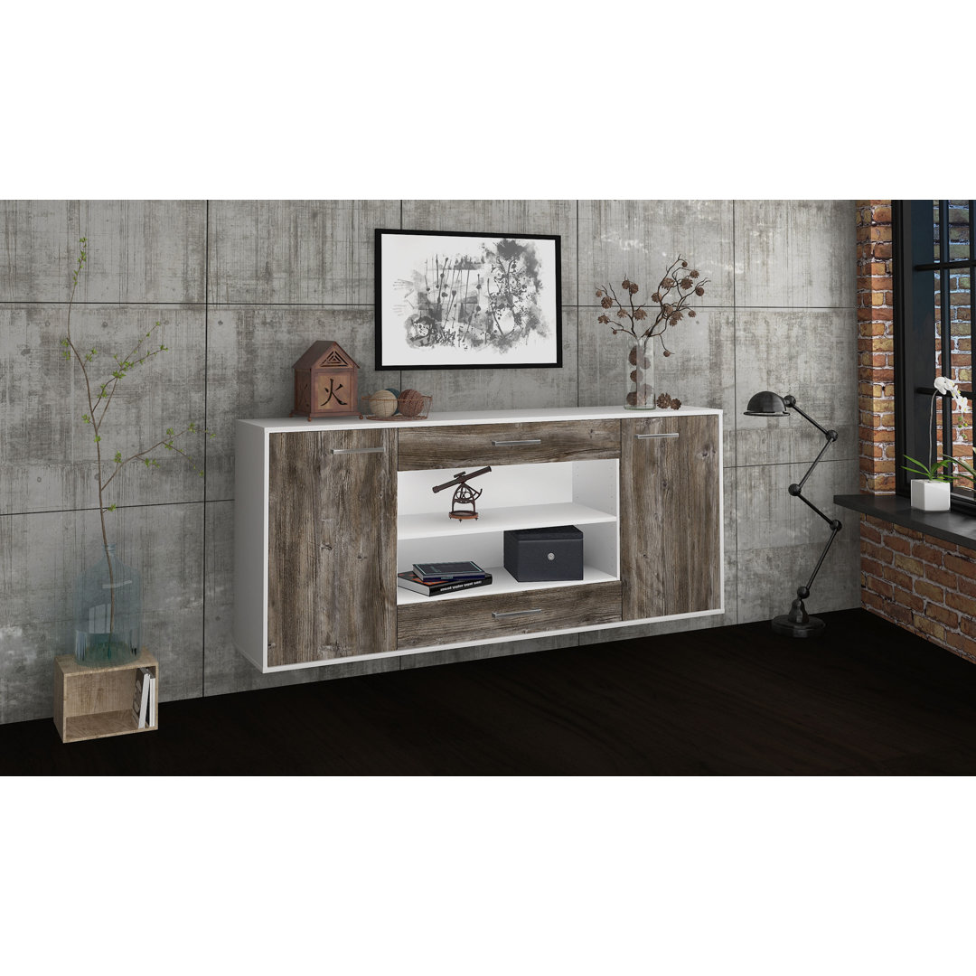 Das Sideboard Mussab hat Metallgriffe. Es hat die Maße 180 cm x 79 cm x 35 cm.