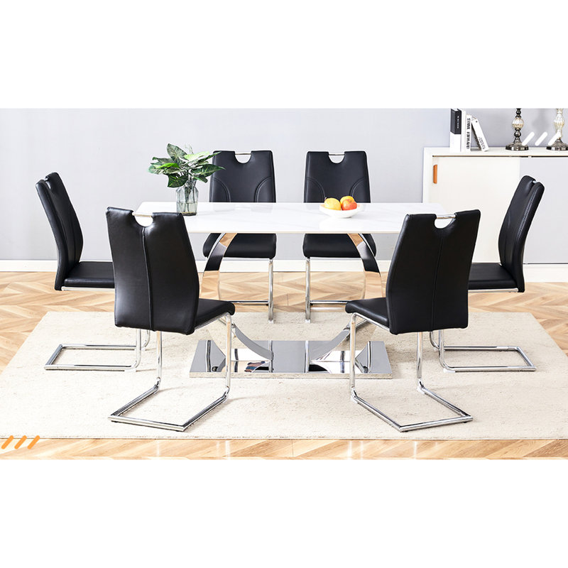 Chaise de salle à manger Black Pu (6 pièces) - Améliorez votre expérience. Surface douce, rembourrage en éponge épaisse. Forme ergonomique. Pieds argentés modernes. Fonction de glissement. Capacité de charge élevée. Installation facile de 6