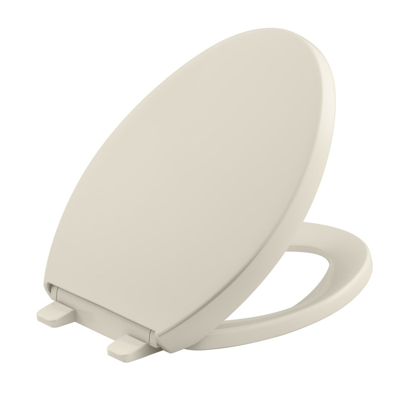 Reveal Quiet-Close with Grip-Tight Toilet Seat, Almond, Elongated