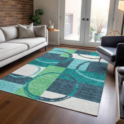 Tapis rectangulaire Aleh avec envers antidérapant