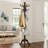 Vintage Birchwood Floor-Standing Coat Rack With A Stable Triangular Base And 14 Hooks. A Classic Design Suitable For Entryways Or Offices.