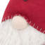Gnome debout tenant un cadeau