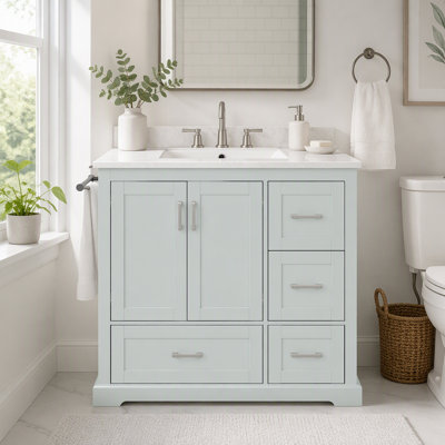 Meuble-lavabo de salle de bain avec lavabo en céramique, 4 tiroirs et portes à fermeture en douceur