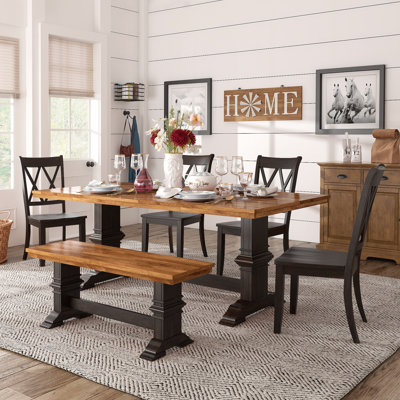 Ensemble de salle à manger Sloan 78 po en bois massif fini chêne avec chaises à dossier en X - 7 pièces, table, chaises et banc à piètement noir antique