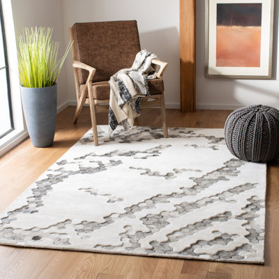 Tapis abstrait en viscose / cuir / coton touffeté à la main Jarrell