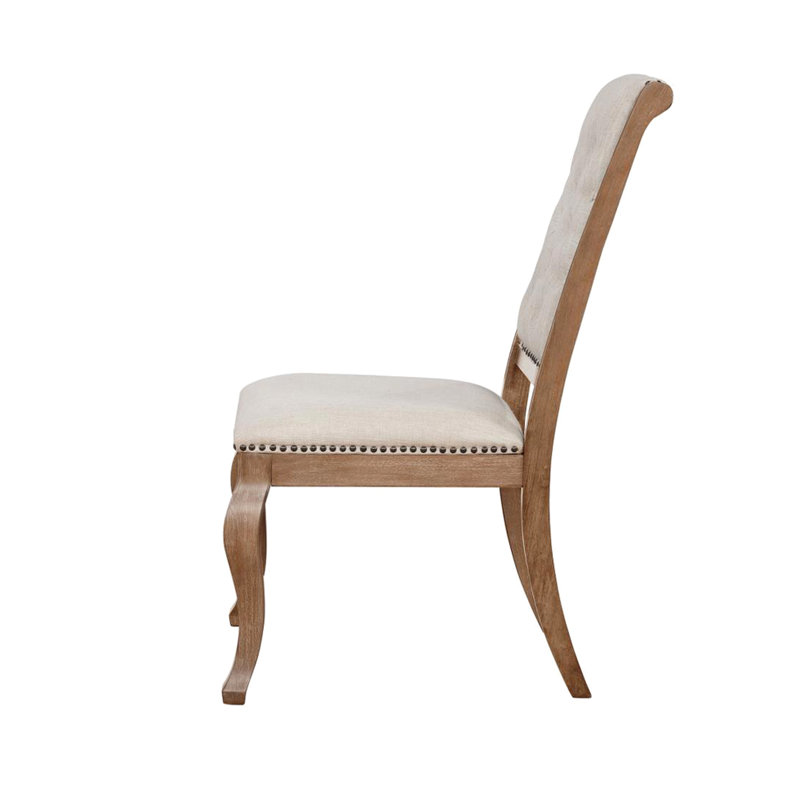 De 2 chaises de salle à manger en tissu crème et ornements bruns