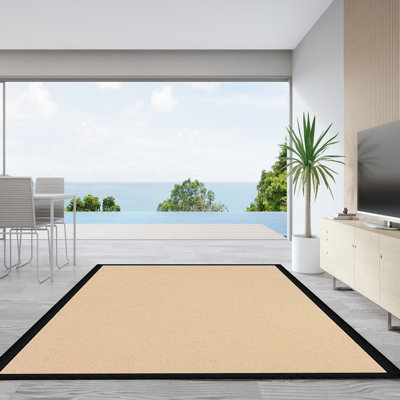 Nannette Handmade Light Beige Berber with Black Faux Leather Border Made in the USA Area Rug