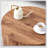 The cylindrical table with its patterned design can be easily integrated