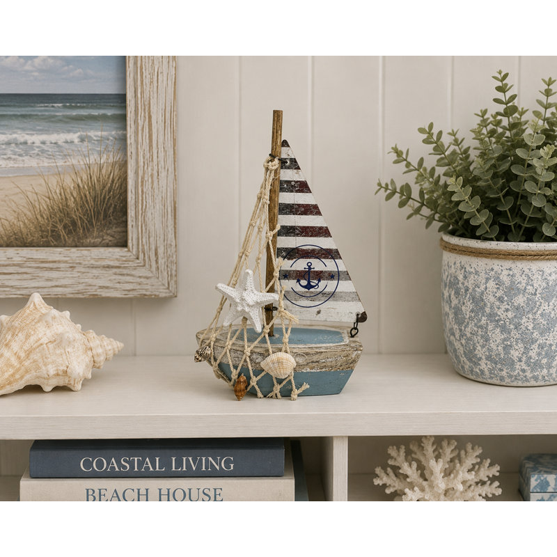 Sailboat With Net And Shells Figurine
