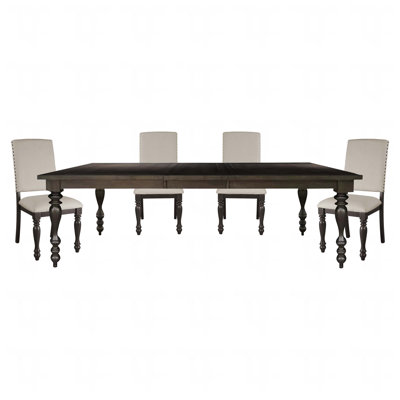 Table de salle à manger à finition brune avec table et chaises d'appoint