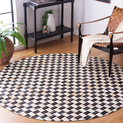 Tapis en cuir noir / ivoire Mahsa Studio