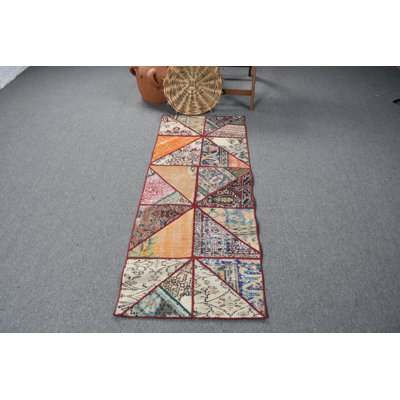 Vibrant Bohemian Style Vintage Turkish Runner Rug with Unique Geometric Design in Patchwork