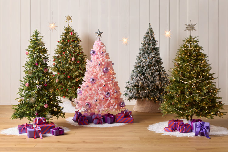 christmas tree decoration ideas with five christmas trees in different colors and styles with purple and pink presents under the trees