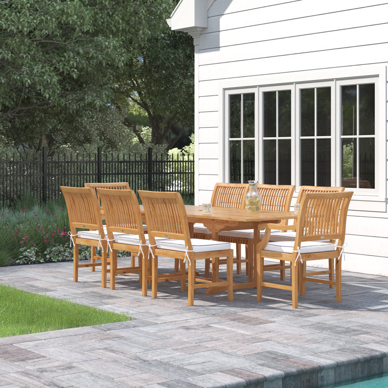 Anquinetta 8 - Person Teak Wood Patio Dining Set with Rectangular Table , Cushions Included