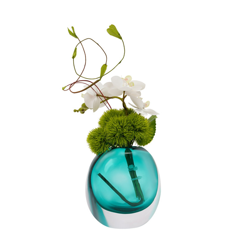 Arrangement de fleurs artificielles dans un vase, Bleu