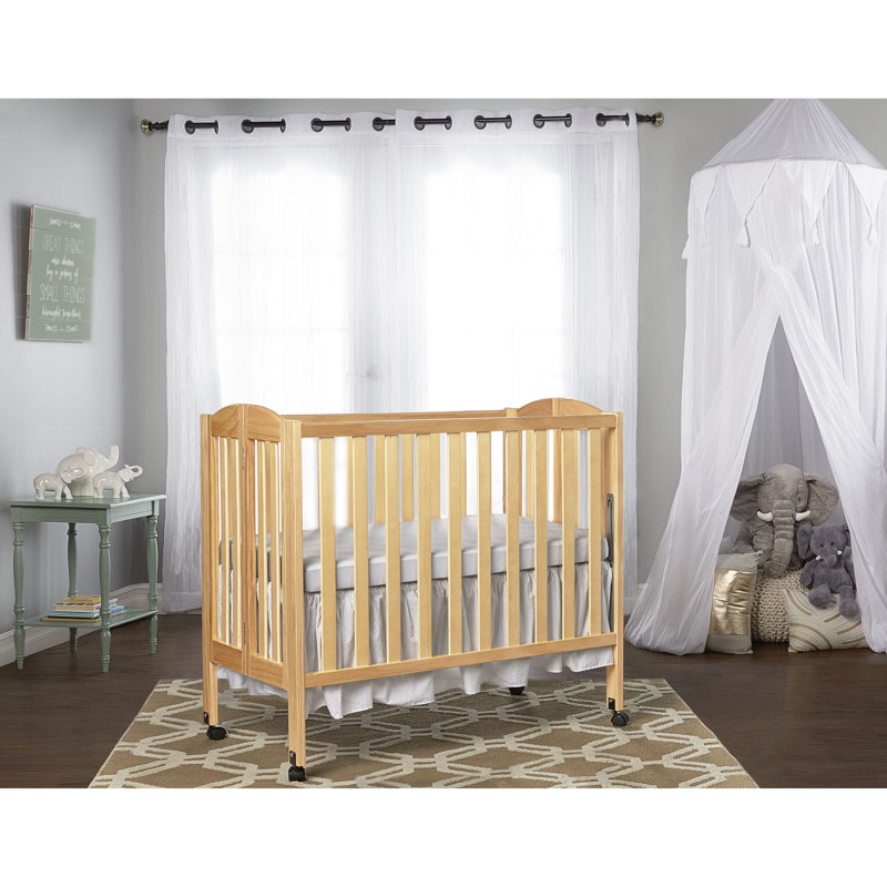 Natural Pine Convertible Folding Portable Crib with Locking Wheels