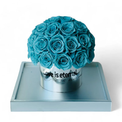 Arrangement de roses en boîte