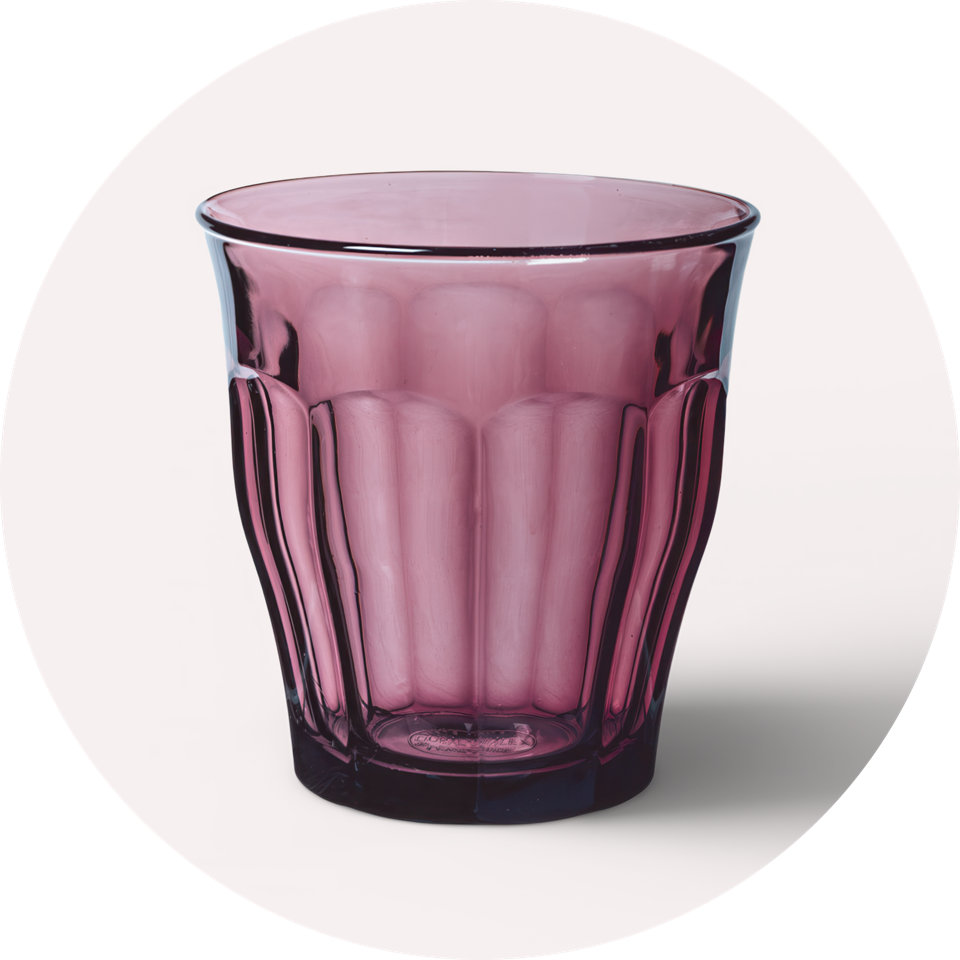 Purple glass tumbler.