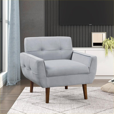 Chaise de salon en velours capitonnée contemporaine