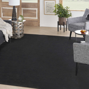 Mullican Sandy Solid Black Easy Care Area Rug
