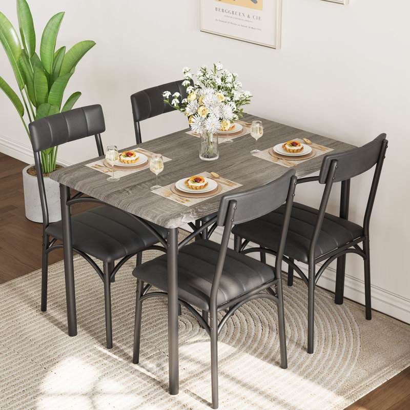 Ensemble de table de salle à manger gris pour 4 tables de cuisine rectangulaires avec 4 chaises rembourrées Ensemble de table de salle à manger 5 pièces pour appartement, studio, petit espace, robuste et peu encombrant