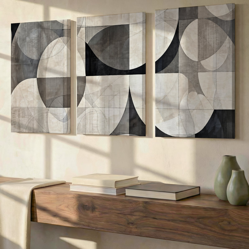 Ensemble exclusif de 3 toiles panoramiques modernes à motifs géométriques circulaires gris, noirs et crème, idéal pour décorer un salon, une chambre ou un bureau.