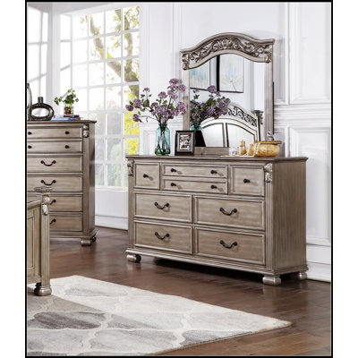 Antique Silver Wooden Dresser And Mirror Set With Elegant Design And Ample Storage, Perfect For Traditional Bedrooms.