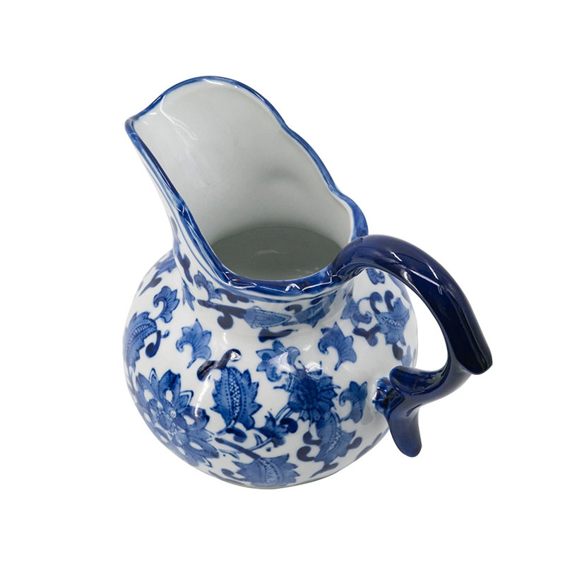 Vase en forme de pot à lait en céramique bleu et blanc avec motif floral et poignée