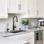 Robinet de cuisine rétractable avec poignée simple et plaque de pont-70944584