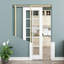 Porte coulissante escamotable 28x96 avec fermeture amortie, 10 carreaux de verre clair, âme pleine, peignable et imperméable, utilisable comme porte de buanderie, porte de placard, porte de chambre ou porte cachée.-124237328