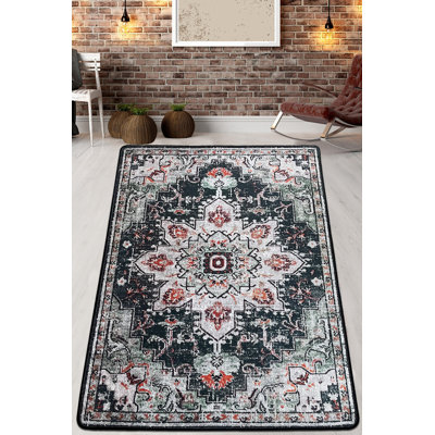 Tapis oriental en polyester tissé à la machine noir / beige / rose Amaud