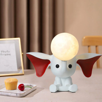 Caricature d'une lampe de table en résine