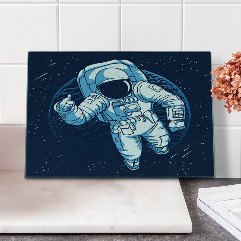 Dessin d'une planche à découper en verre trempé Ambesonne Ambesonne Spaceman Blue Sky Blue