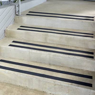 Tapis d'escalier gris
