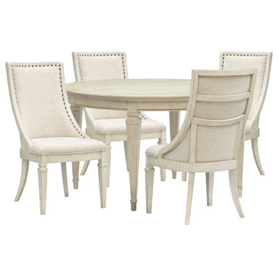 Table de salle à manger extensible ronde avec 4 fauteuils et un buffet
