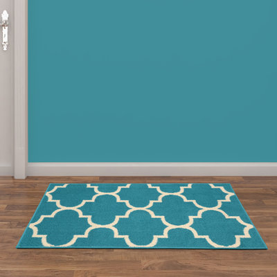 Boody Geometric Tufted Teal/Ivory Area Rug